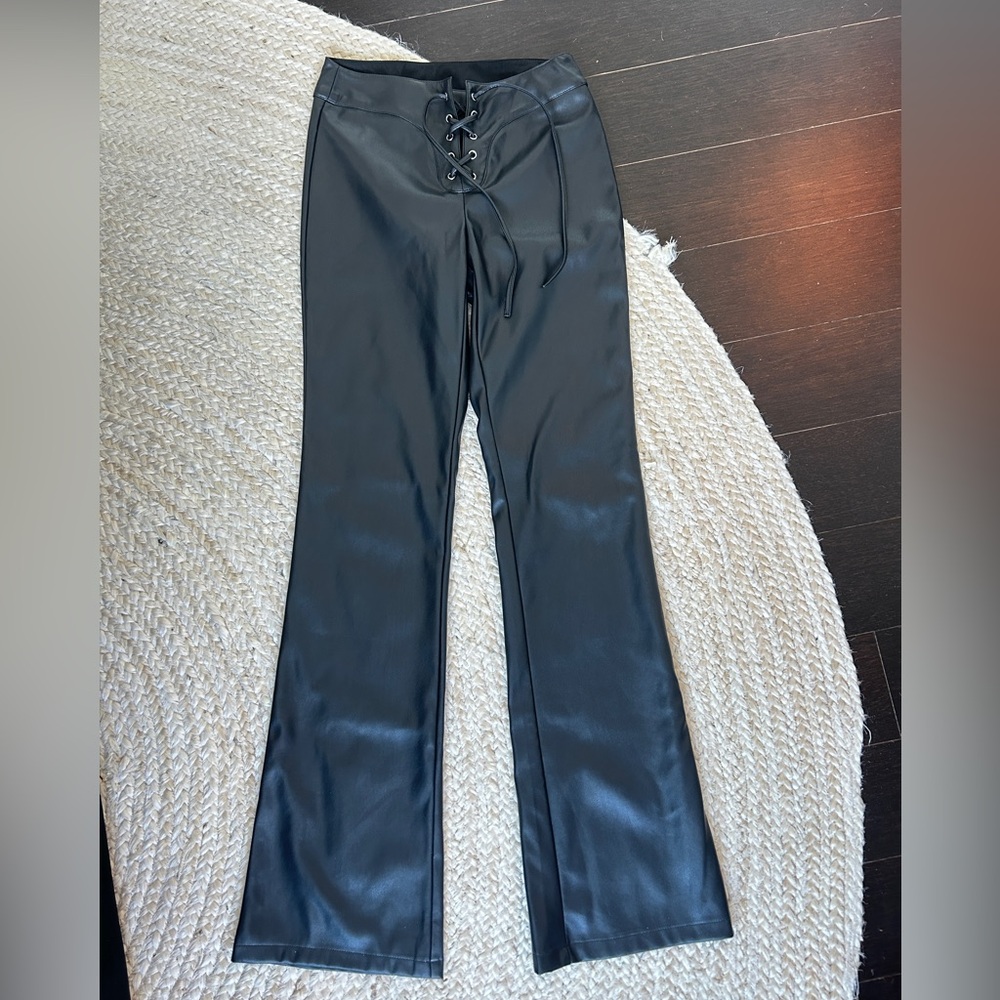 Lace up black leather pants